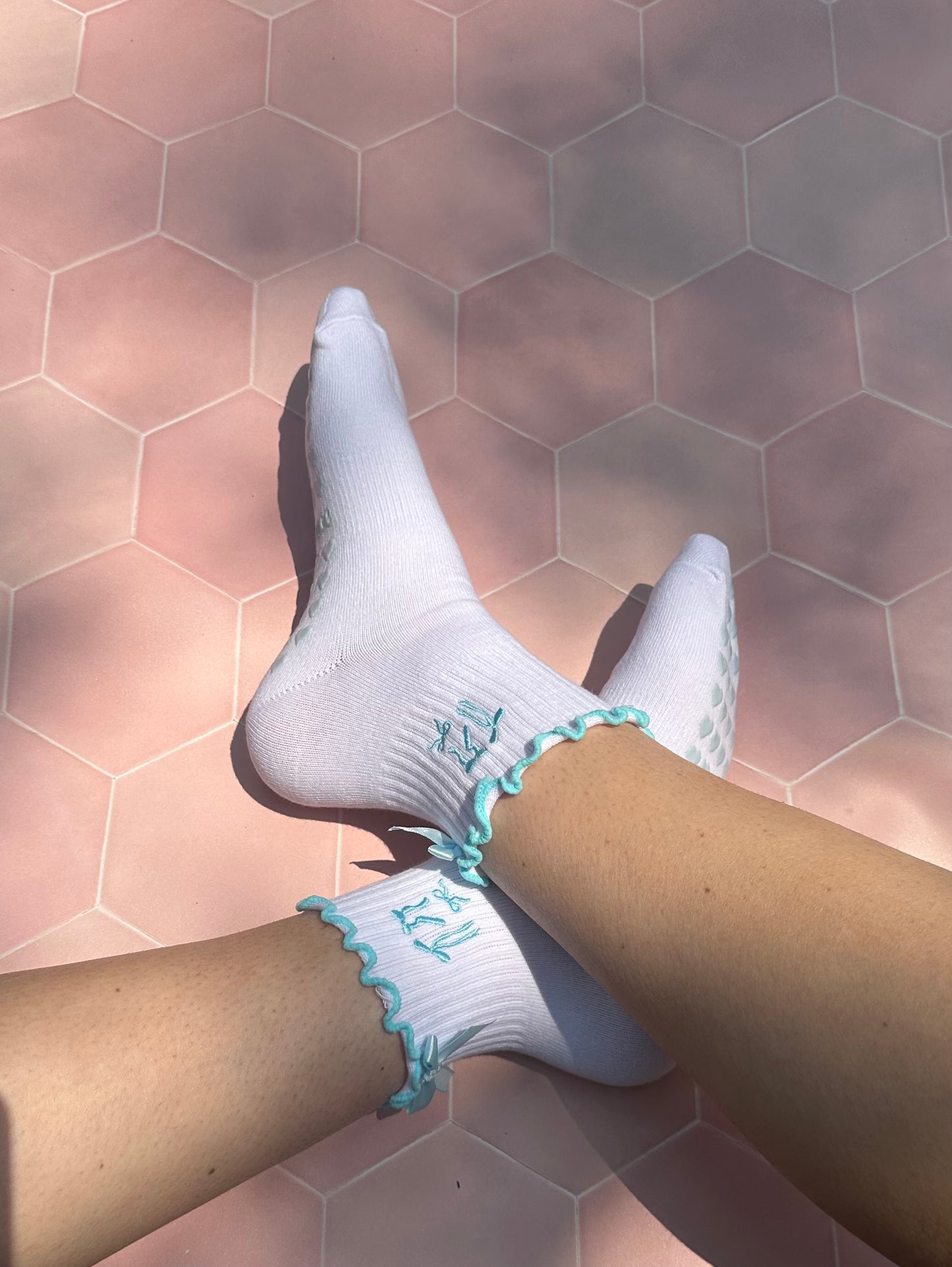 Light blue coquette bow grip sock