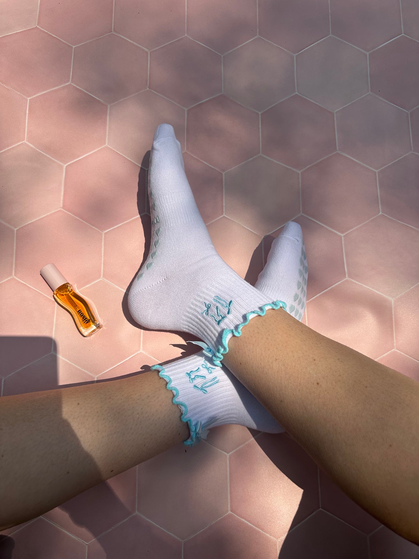 Light blue coquette bow grip sock