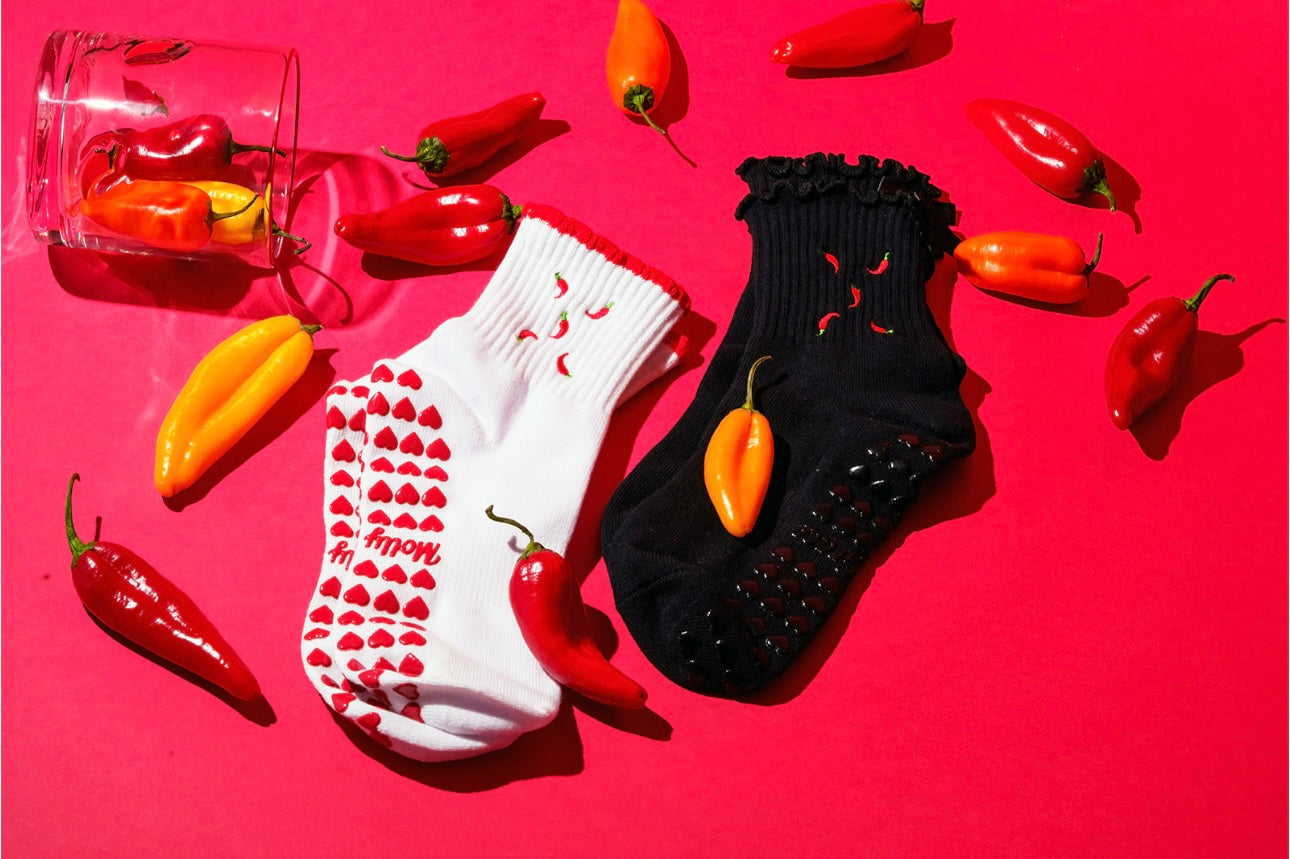 Red and white hot chili pepper grip sock with red heart grips