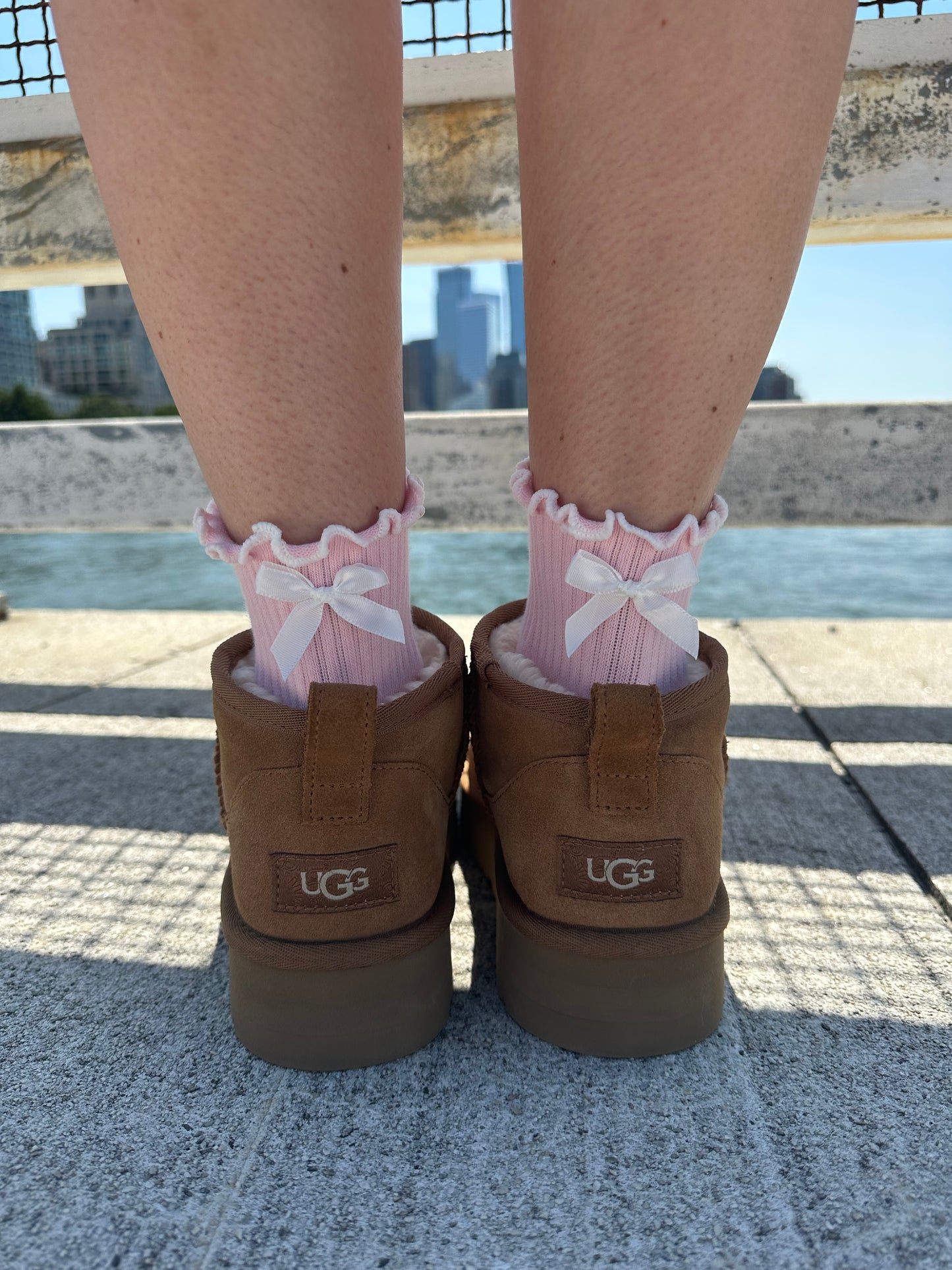 Light Pink ruffle grip sock with white bow