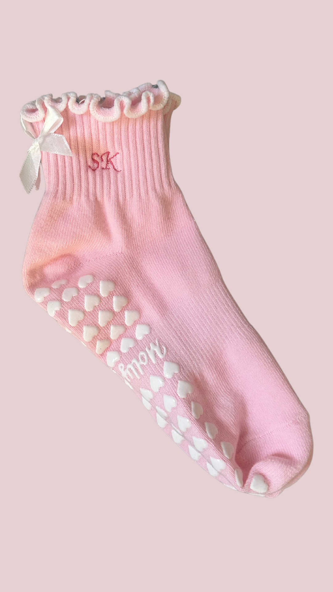 Pink & white custom initial grip sock with white bow