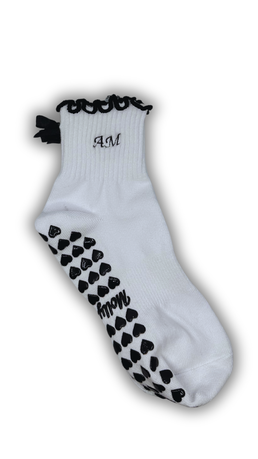 Black & white custom embroidered initial grip socks with black bow