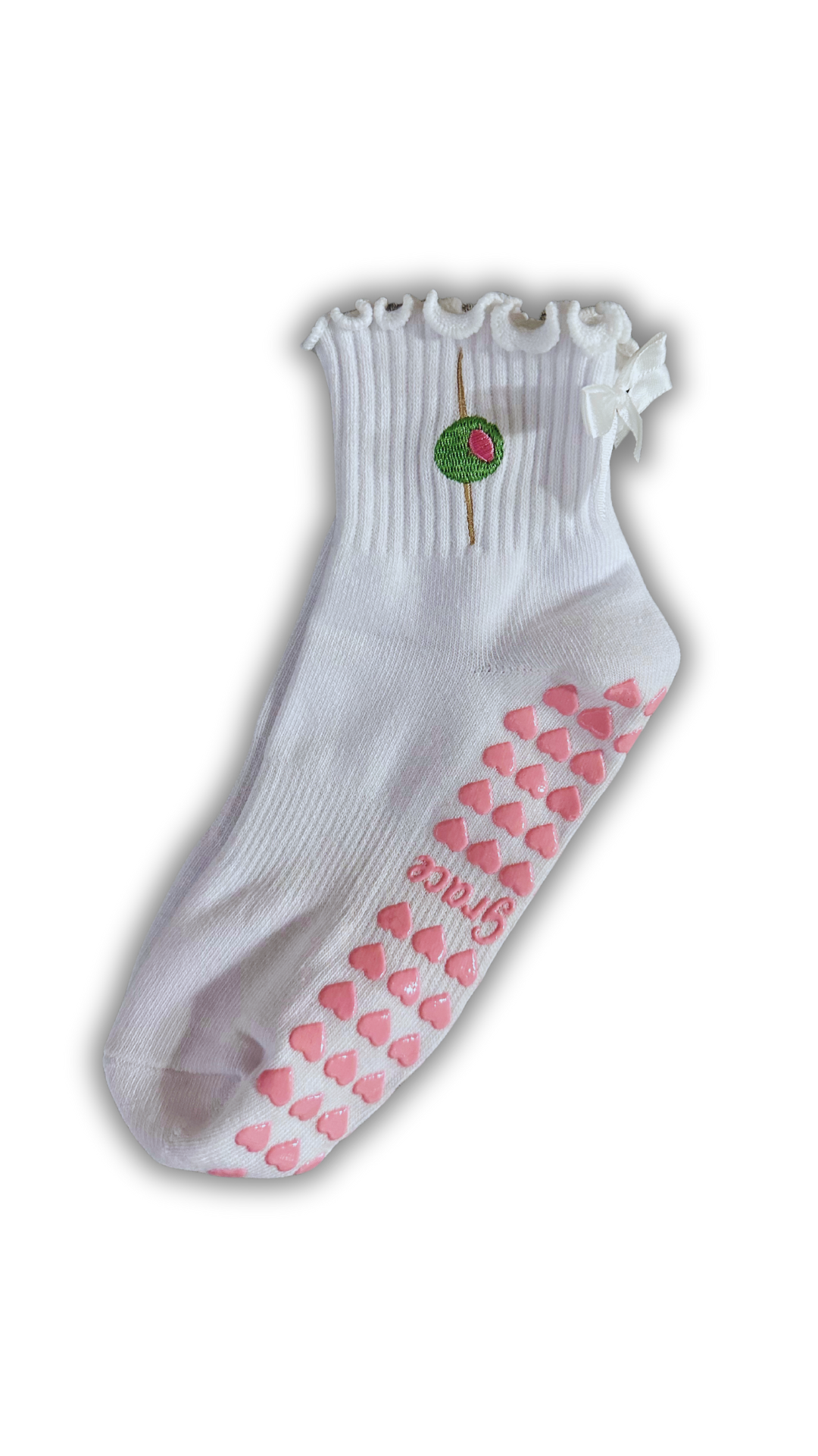 White ruffle olive grip sock with white bow and pink heart grips