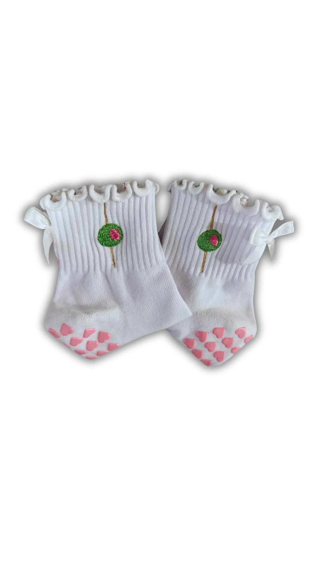 White ruffle olive grip sock with white bow and pink heart grips