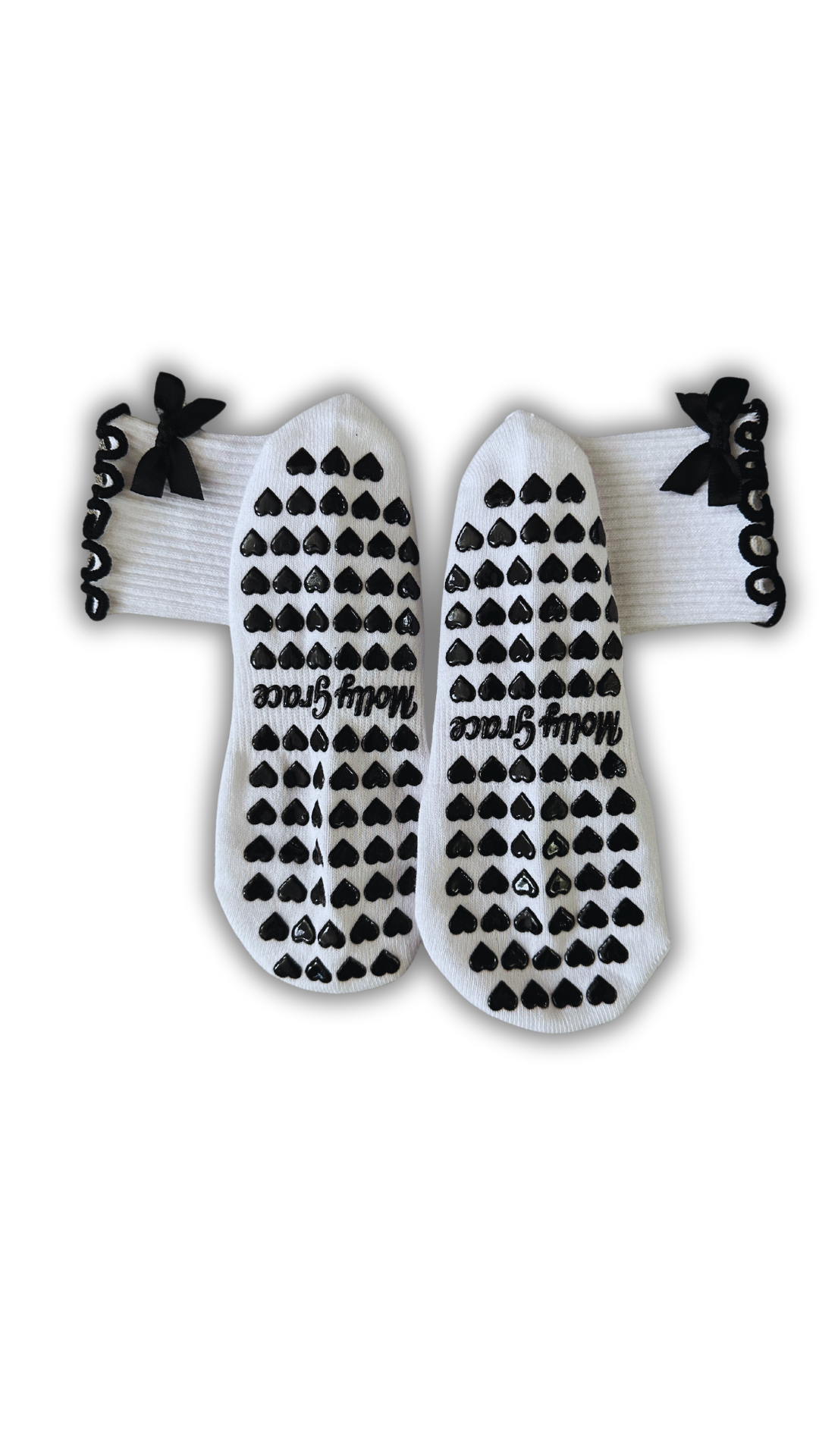 Black & White bow grip sock with heart grips